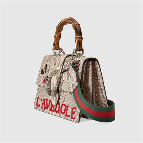 gucci purse tiger head|Gucci dionysus snake bag.